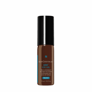 A small bottle of dark brown liquid concealer with a black cap.