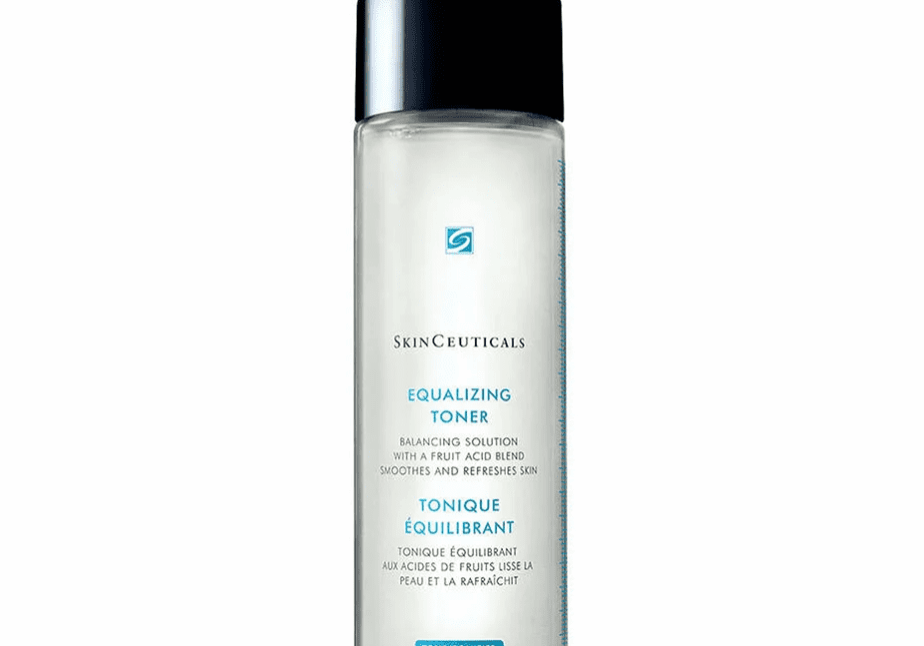 A clear bottle of facial toner with a black cap.