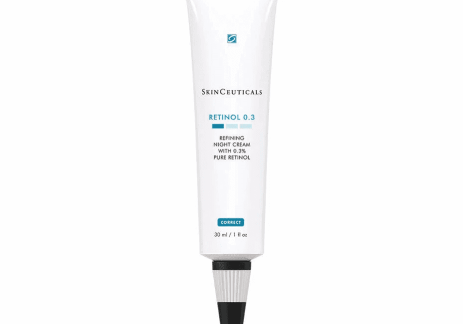 A white tube of skincare product with a black nozzle and blue label.