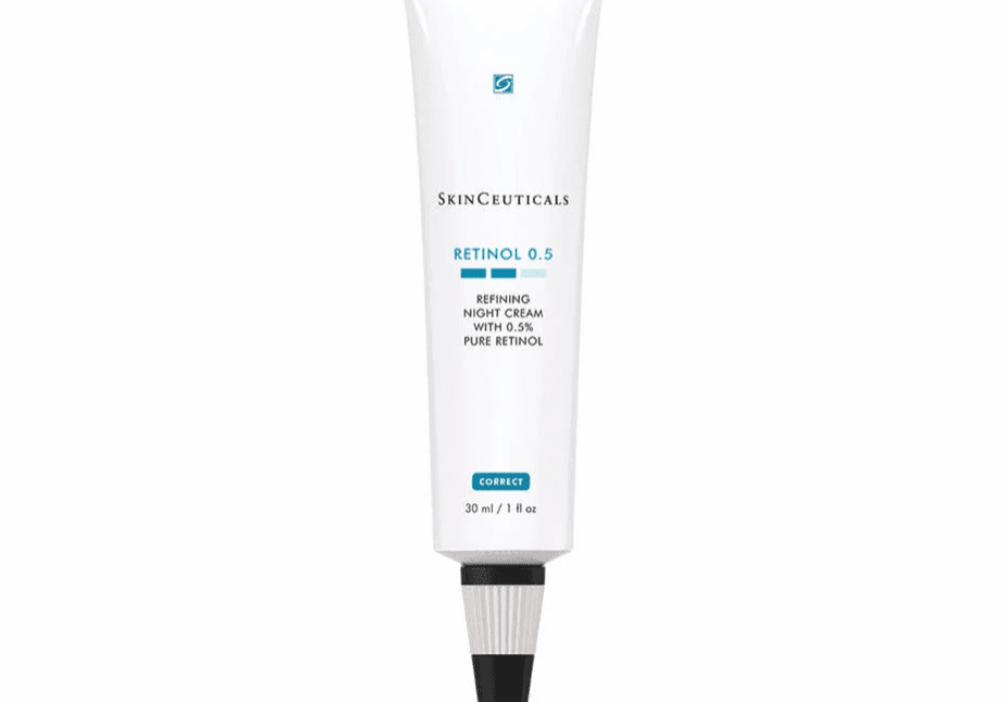 A white tube of skincare product with a black nozzle tip.