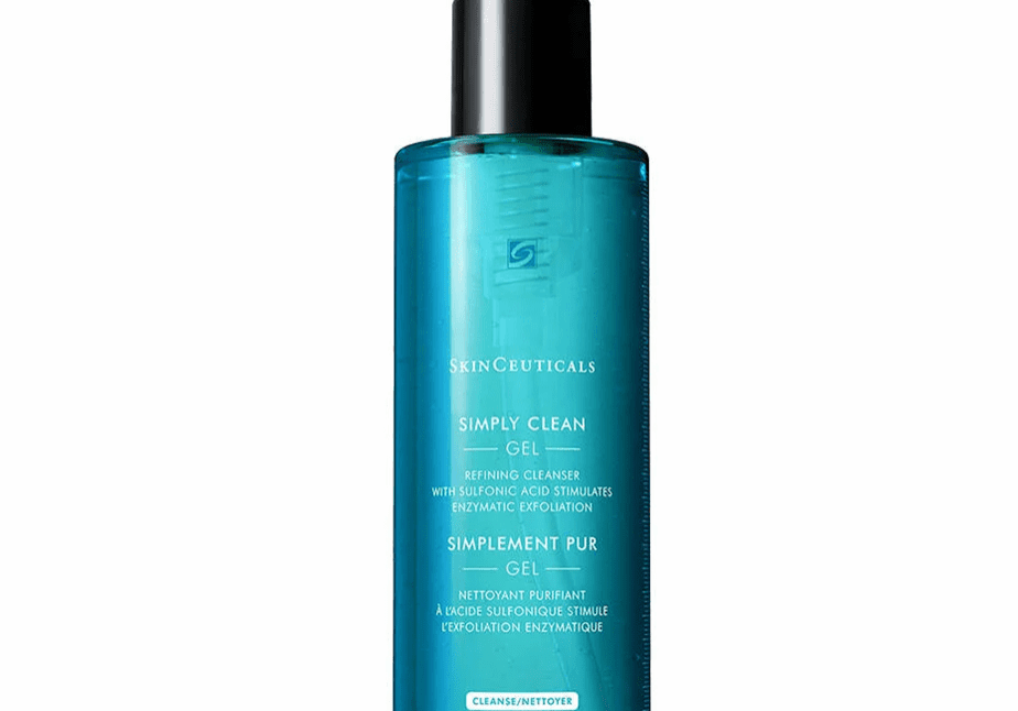 Blue bottle of facial cleansing oil with a pump dispenser.